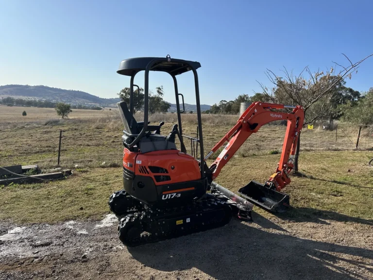 Kubota U17-3 mini excavator in a field