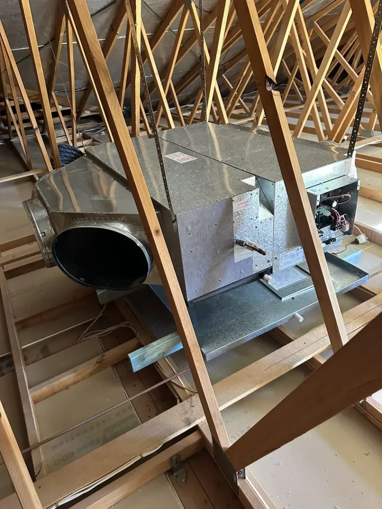 HVAC unit installed in attic.